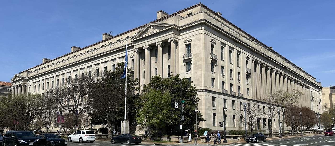The Robert F. Kennedy Department of Justice Building in Washington, where the statement of interest backing OpenAI on fair use was filed