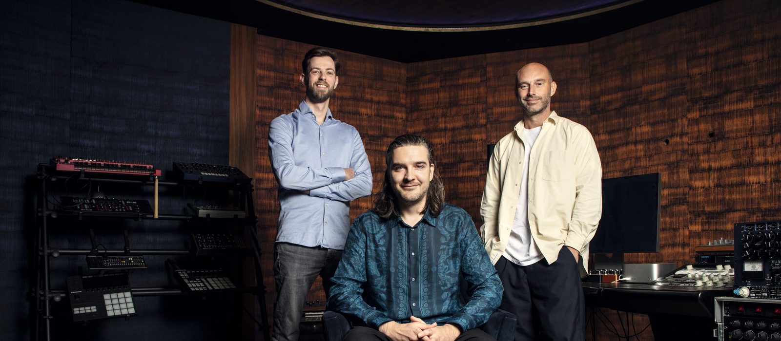 GasLab co-founder Reinier Zonneveld seated in a studio between core team members Cas Luuring and Thijs Emondts