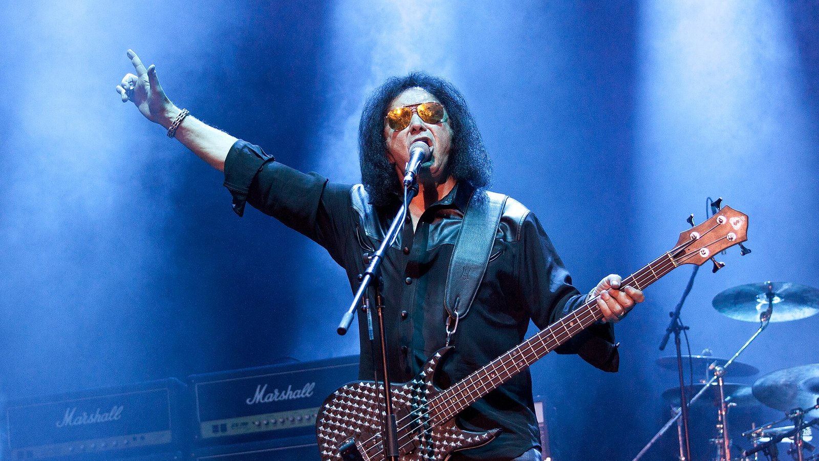 Gene Simmons singing and playing bass on stage at Masters of Rock 2018 in the Czech Republic