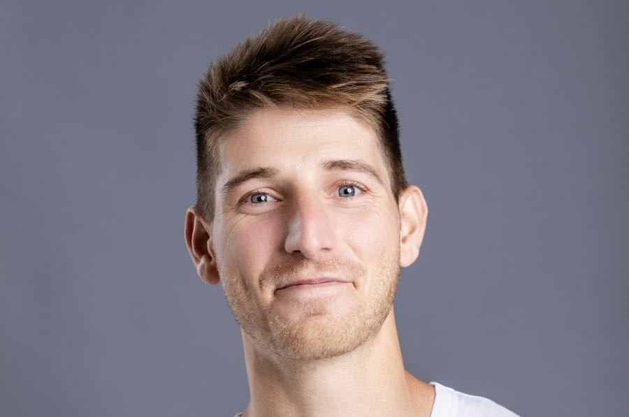 Suno chief product officer Jack Brody, headshot against a grey background