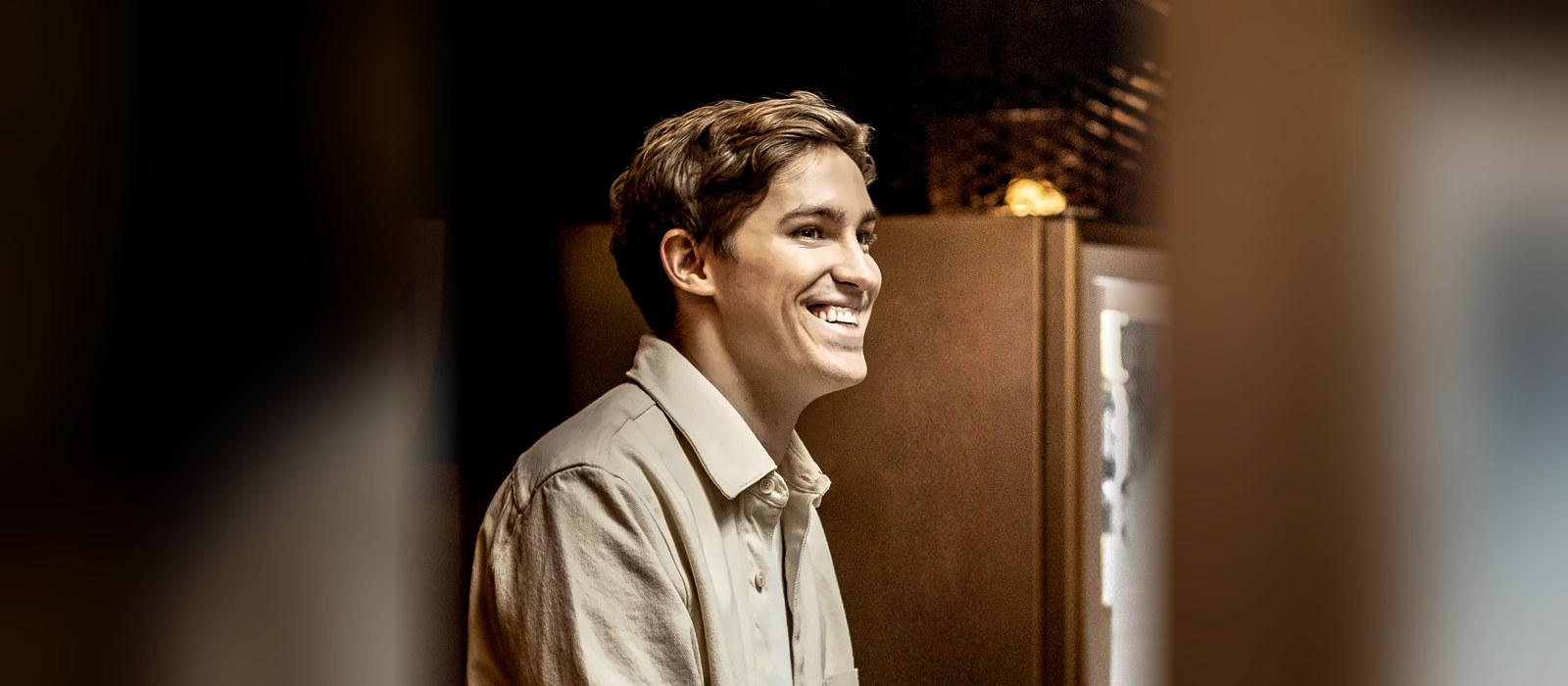 ElevenLabs co-founder and CEO Mati Staniszewski smiling in a 2022 photo by Rafał Masłow