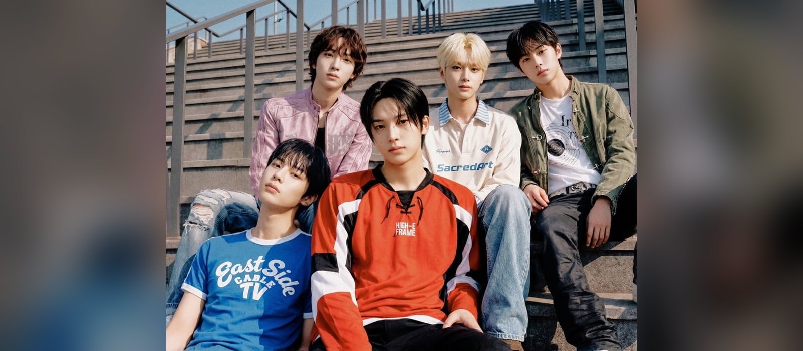 The 5 AI-generated members of K-pop boy group muuo:23 sitting on outdoor stairs