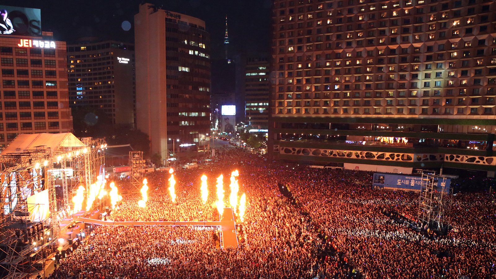 Crowd and stage flames at Psy's Gangnam Style concert for fans at Seoul Plaza, October 2012