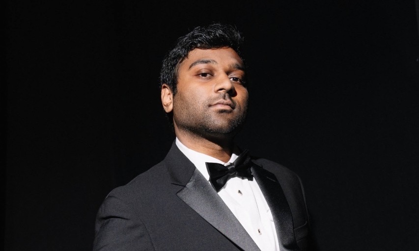 Rohan Paul, Controlla co-founder and CEO, in a black tuxedo and bow tie against a dark backdrop