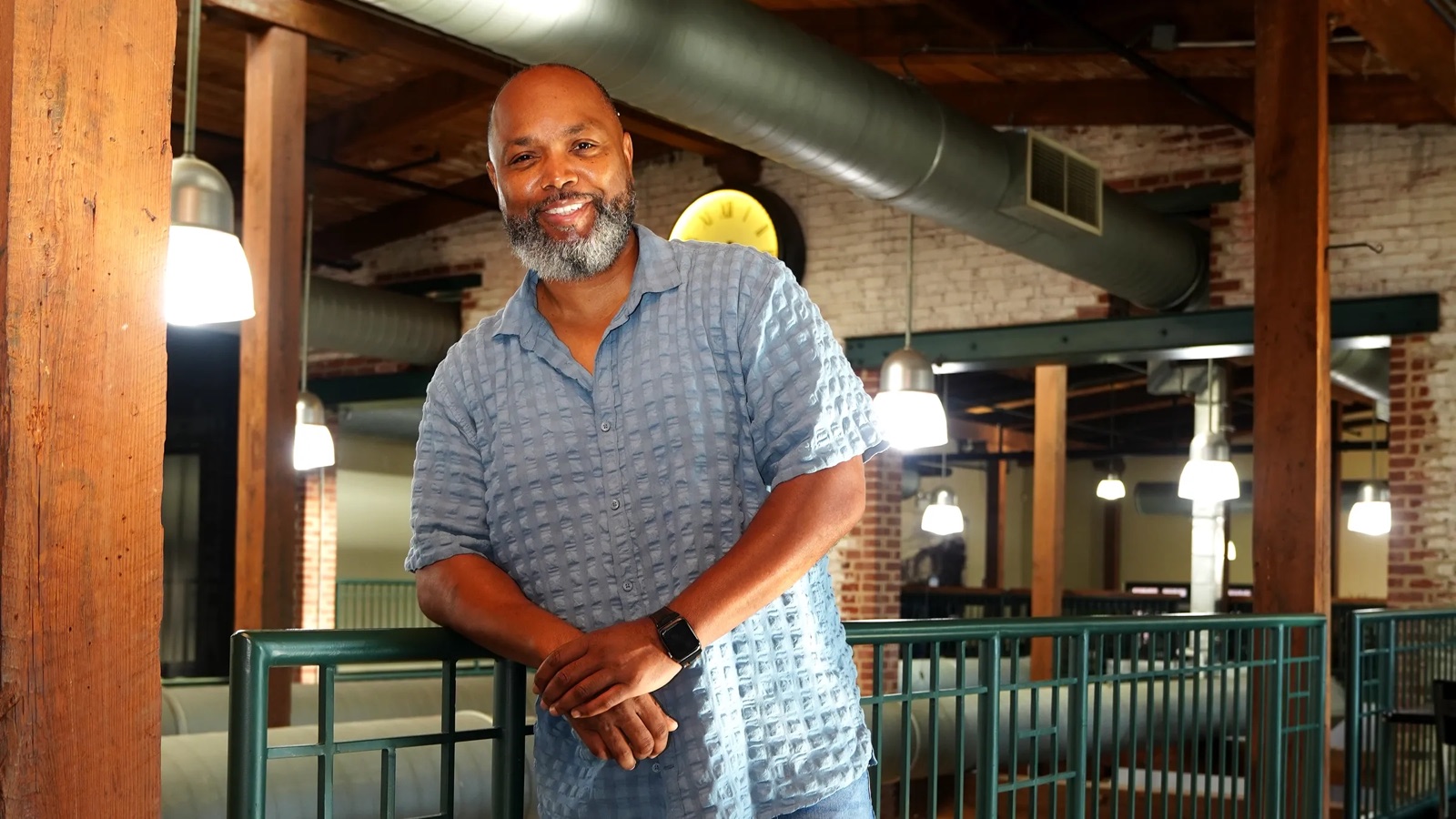 Samori Coles, generative AI director and 30-year music industry veteran, standing in a converted warehouse studio in Philadelphia