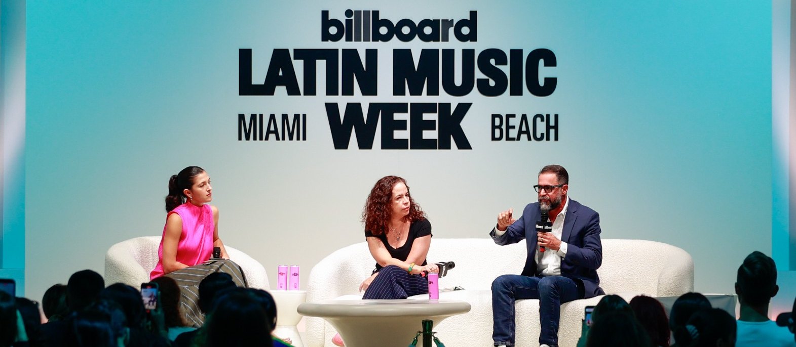 Tatiana Cirisano, Cristina Perpiñá-Robert and Pierre Hachar Jr. on stage at Billboard Latin Music Week 2026 in Miami Beach