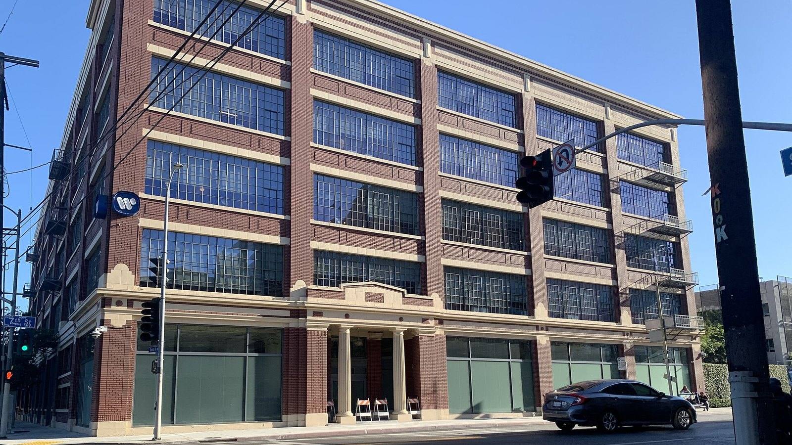 The Warner Music Group headquarters building in downtown Los Angeles with the company's W logo on the corner