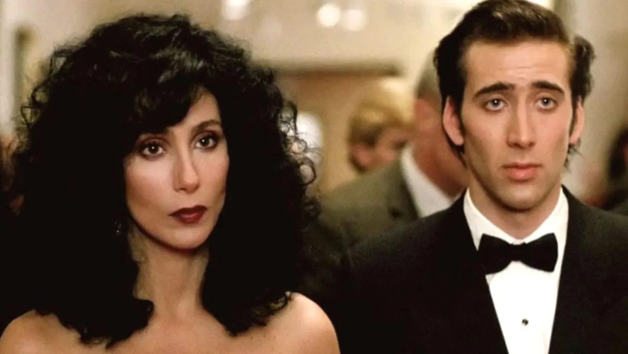 A scene from the 80s movie Moonstruck with Nicholas Cage and Cher.