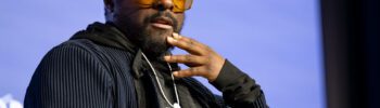 Will.i.am invests in AI to boost inclusion through his company FYI (Focus Your Ideas) and speaks out against over-regulation.