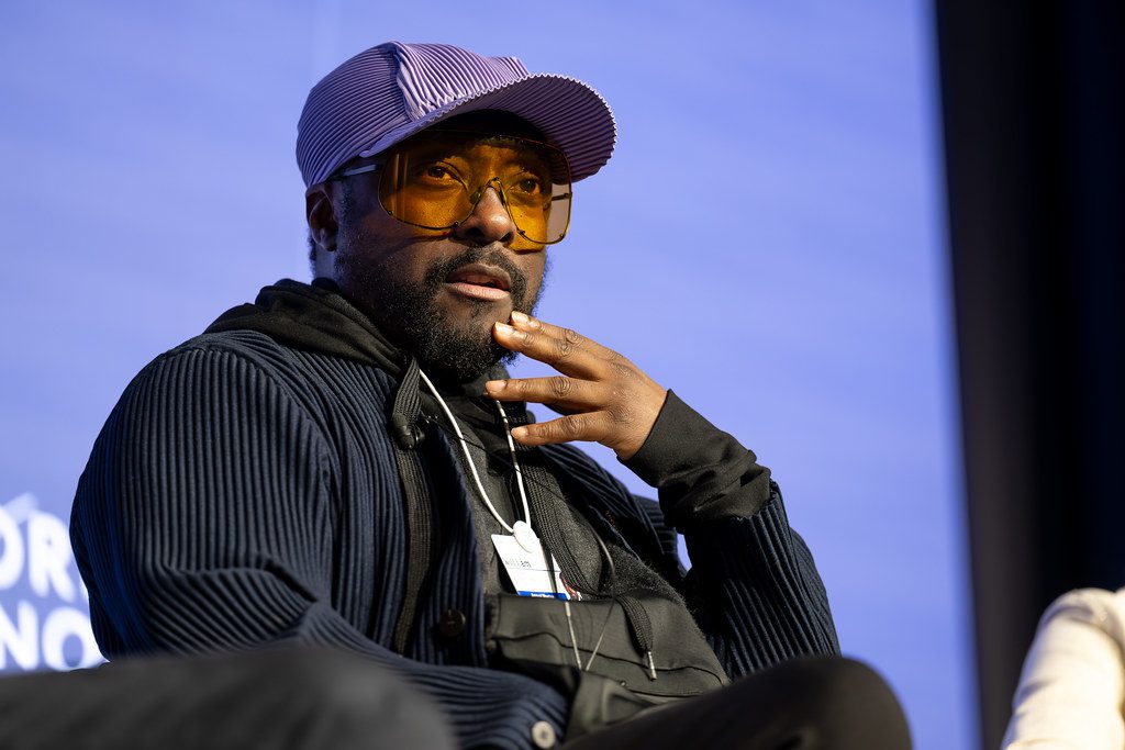 Will.i.am invests in AI to boost inclusion through his company FYI (Focus Your Ideas) and speaks out against over-regulation.