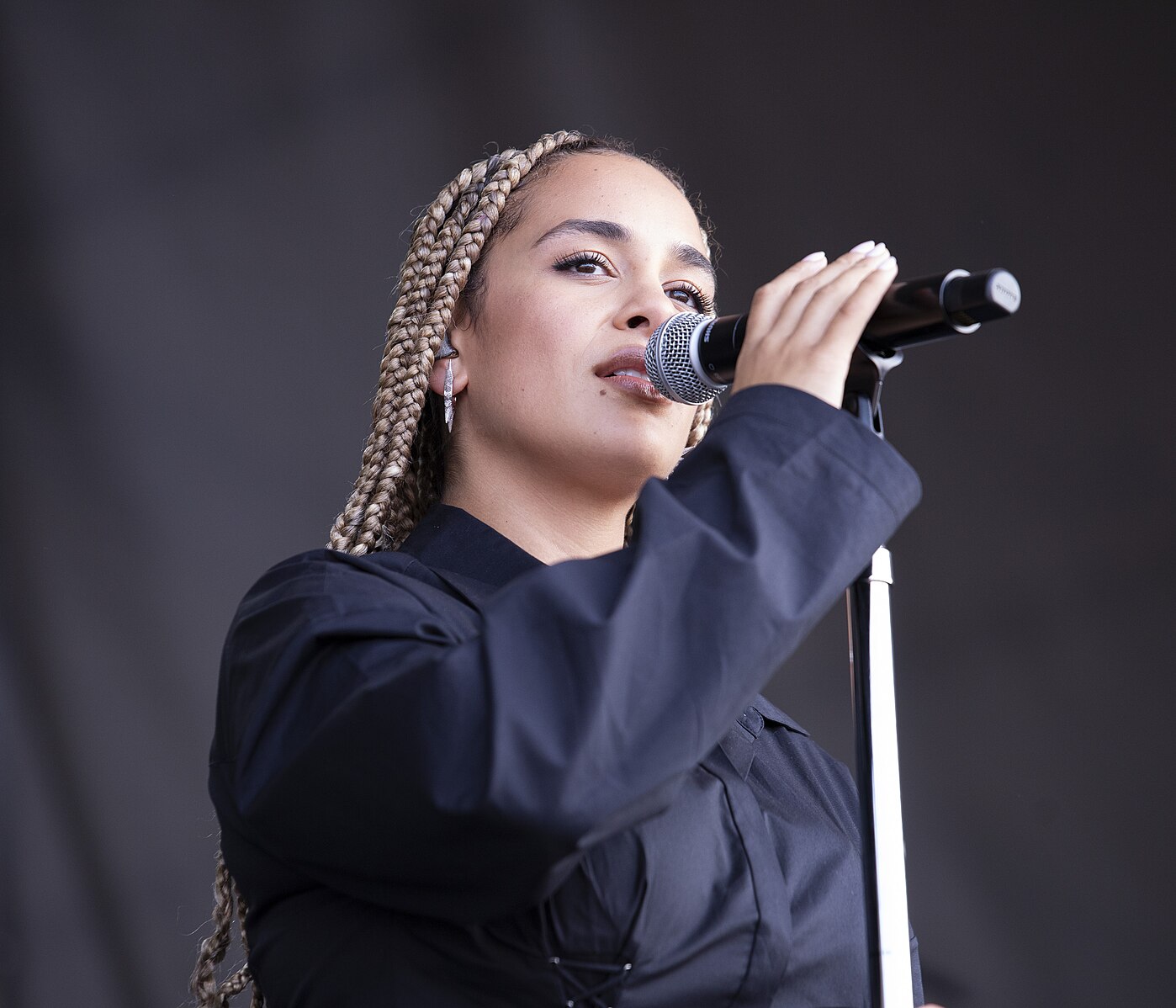Jorja Smith sings passionately on stage at the Newport Jazz Festival.